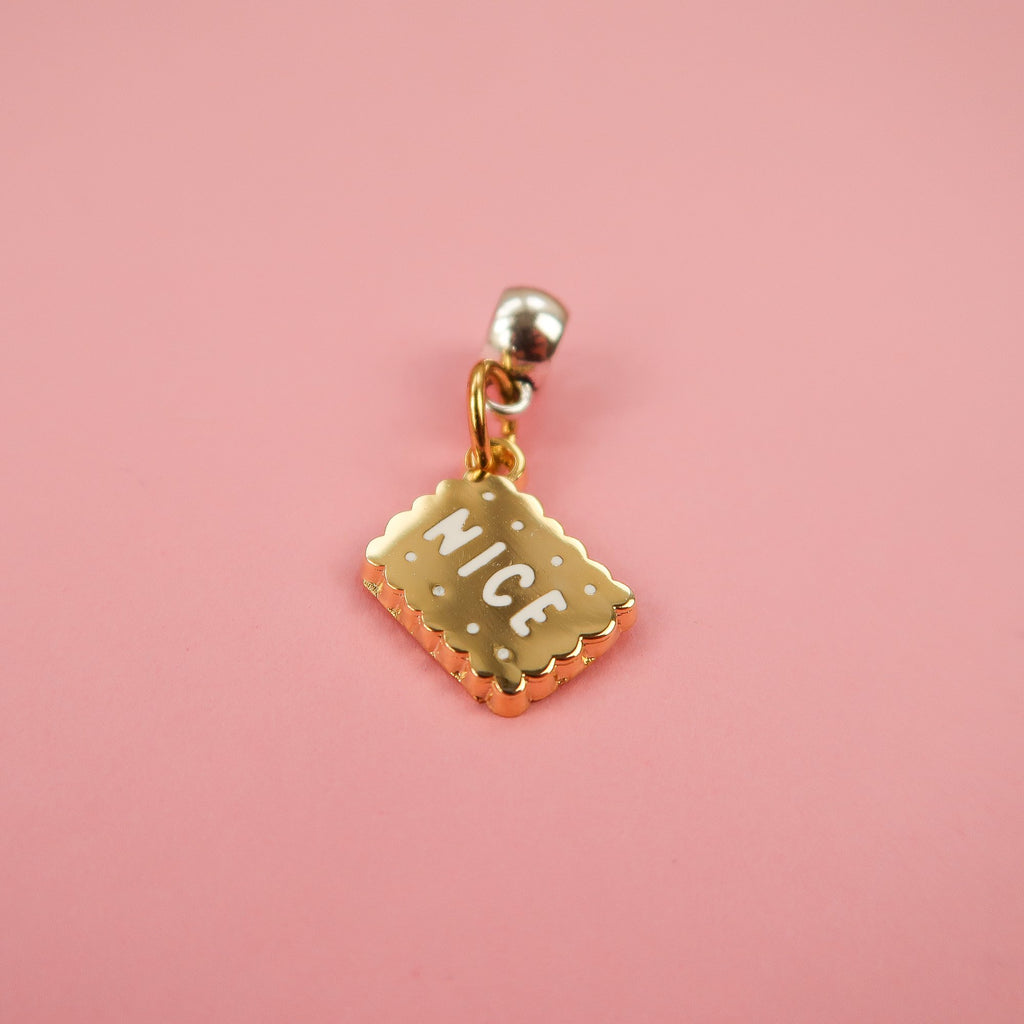 Nice biscuit gold charm by Nikki McWilliams