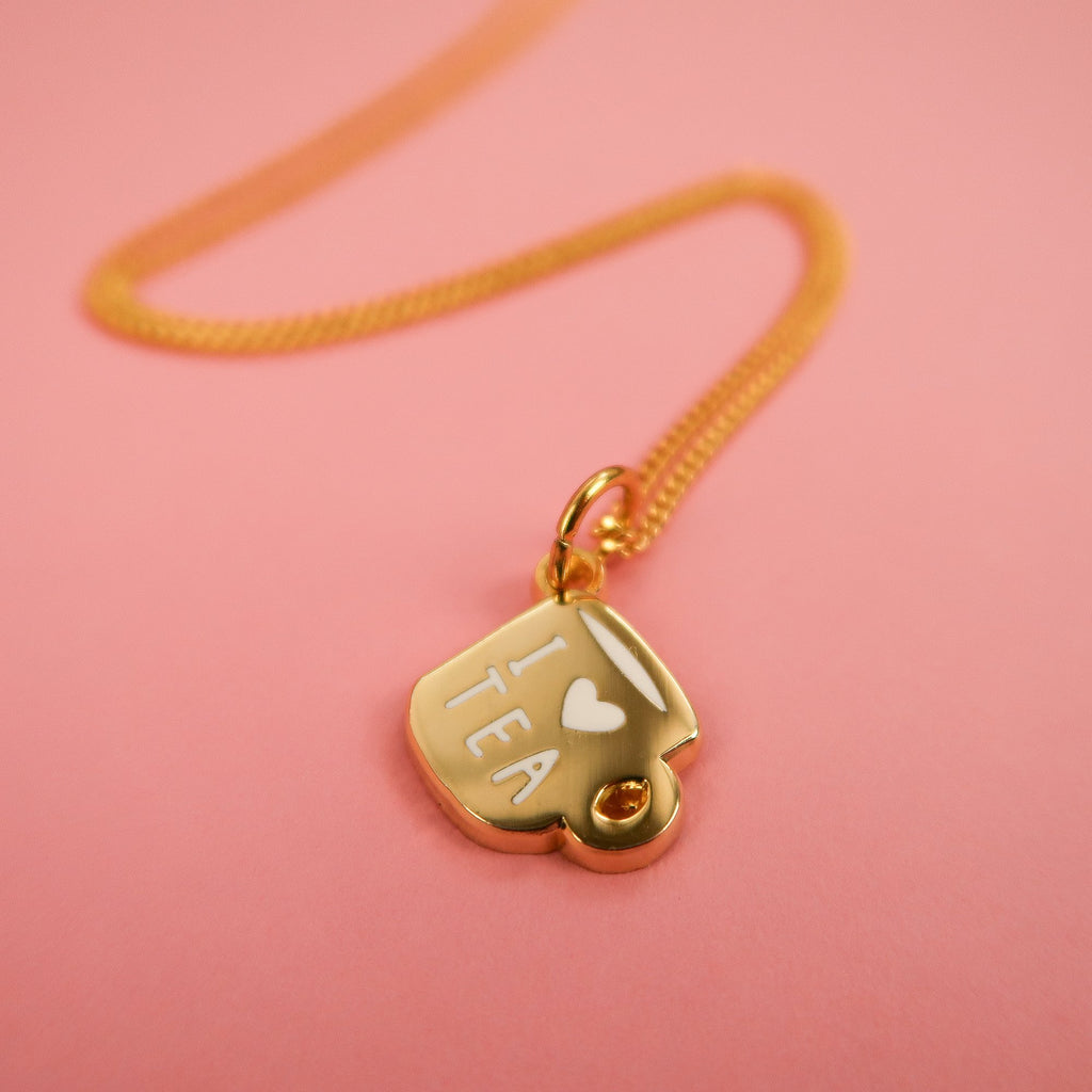 Gold Cup of tea necklace by Nikki McWilliams